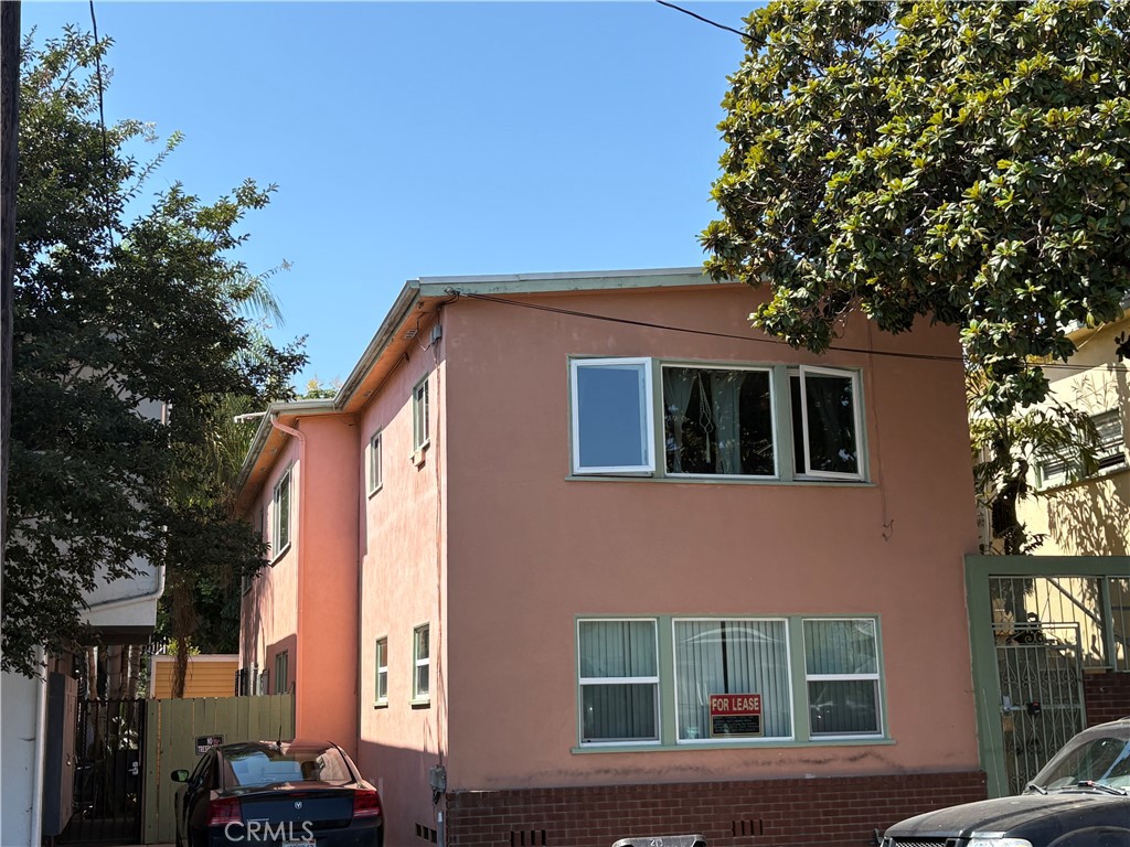 Spacious, stylish one bedroom one bath corner unit condo in a quiet, gated small, seven unit building. Recently remodeled bathroom. Gleaming hardwood floors. Beautiful moldings. Sunny with lots of double paned new windows to let the sun in and keep the noise out with nice window vertical blinds. Good size dining area. Plenty of closets. Refrigerator, stove and microwave are included. Nice laundry room in the complex. the front door of the 3 blocks to Ocean and bike path. Close to shopping, Broadway entertainment corridor and the trendy East Village.