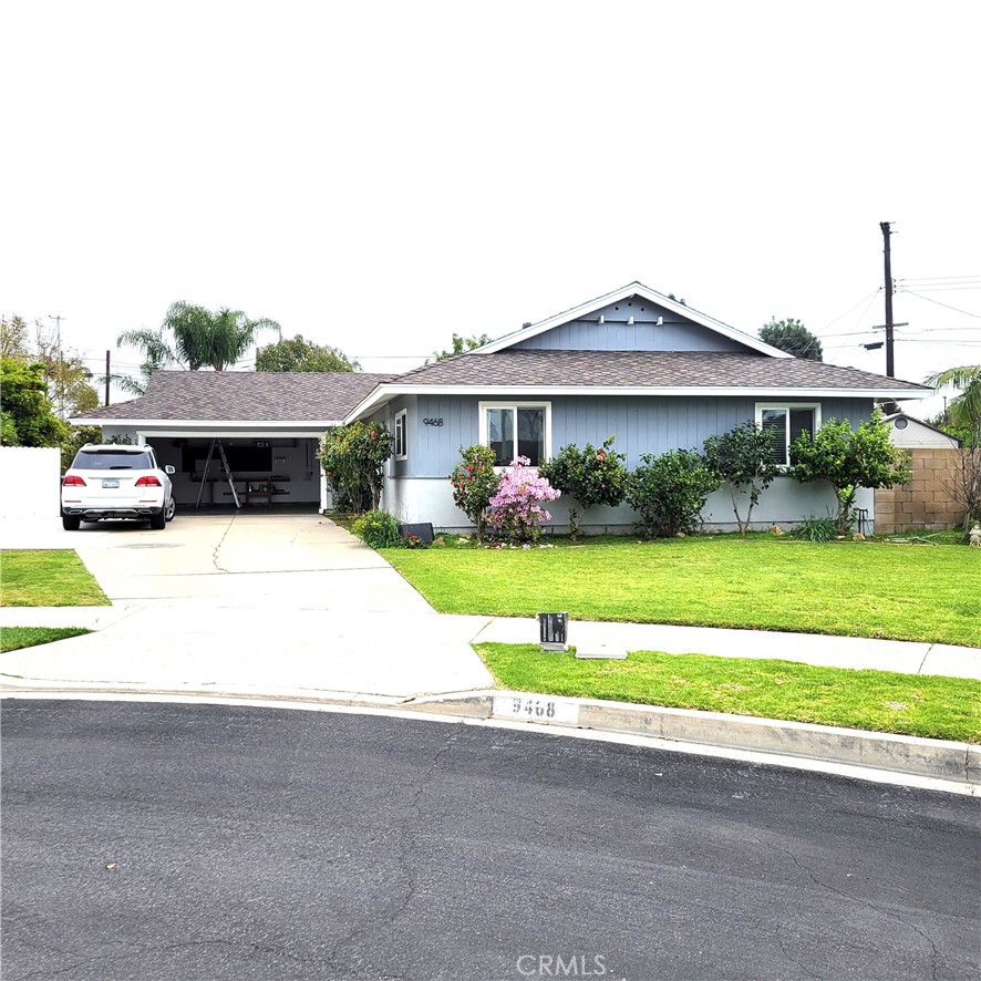 Nestled on a generous corner lot in a quiet cul-de-sac, this beautifully updated 4-bedroom, 2-bath home offers comfort, style, and functionality in the highly sought-after Fountain Valley School District. Step inside to textured ceilings, elegant crown moulding, and engineered hardwood flooring throughout the main living areas, with plush carpeting in the bedrooms. The remodeled kitchen is a chef’s dream, boasting cherry cabinets, gleaming quartz countertops, a high-end stove, dishwasher, and includes a microwave and refrigerator (provided without warranty). Relax by the cozy gas fireplace with custom stone facing in the spacious living room, or retreat to the oversized primary bedroom complete with multiple closets and a luxurious, remodeled en-suite bathroom featuring a walk-in shower. Additional highlights include plantation shutters and a newer air conditioning unit with forced air heating for year-round comfort. The expansive backyard is a private oasis, showcasing a variety of mature fruit trees—including avocado, apple, lemon, lime, pomegranate—and a charming wisteria tree, perfect for relaxing or entertaining. A two-car garage, washer/dryer hookups, and a large driveway with ample space for an RV or multiple vehicles complete this exceptional rental. Centrally located near major freeways and shopping centers, this home offers the perfect blend of suburban tranquility and urban convenience.