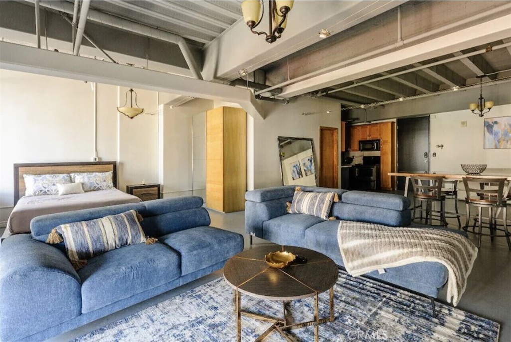 Enjoy a stylish experience at this centrally-located place. This spacious high floor (10th floor) condo in the heart of DTLA's Historic Core has a high ceiling industrial style living room. Upon entry, this condo features views of Pershing Square and the Downtown LA skyline. The kitchen features quartz countertop and stainless-steel appliances. The bathroom offers an oversized soaking tub and stackable washer/dryer. The building provides 24-hr security, front-desk concierge, fitness room, rooftop pool, hot tub and rooftop lounge area with panoramic views of the Downtown Los Angeles. Located within walking distance to the Perch, Le Petit Paris, Pez Cantina, Dragon Centro, 71Above, L.A. Café, Little sister, Bottega Louie, Le Grand & etc. Furniture and electronics can be offered for sale.