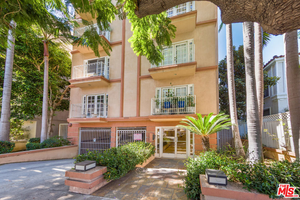 Stunning Front-Facing Corner Unit in Prime Westwood. Impeccably maintained and beautifully appointed, this luxurious and bright front-facing corner residence features 2 bedrooms, 2.5 bathrooms, and a separate den/office/kids' area. The inviting layout includes a spacious and well-proportioned light-filled living rooms, formal dining area with a charming fireplace that opens to a private balcony with serene outdoor views, perfect for relaxing or entertaining. Designed to maximize natural light, the unit boasts large windows in every room and an exceptional floor plan that offers both comfort and functionality. The elegant living and formal dining areas seamlessly connect to a generously sized kitchen equipped with marble countertops and backsplash, stainless steel appliances, ample cabinetry, and a large window framing pleasant views. The versatile den/office/kids' area includes a stylish wet bar and can easily be converted into a third bedroom if desired. Both bedrooms are spacious En-Suites, including a luxurious primary suite featuring a cozy fireplace, private balcony, and a spa-like bathroom with dual sinks, a soaking tub, and a separate glass-enclosed shower. Set within an exclusive 8-unit building offering unparalleled privacy with only two residences per floor. This residence has been freshly painted and is in pristine, move-in ready condition. Additional highlights include beautiful wood flooring throughout the living areas and bedrooms, recessed lighting, in-unit laundry, a secure private two-car garage, and low HOA dues. Located within the sought-after Westwood Charter School District and just minutes from Century City Mall, UCLA, Holmby Hills, Beverly Hills, Rancho Park, Brentwood, and Santa Monica. With easy access to major freeways (10 & 405), Metro station, top-tier shopping, dining, and entertainment, this is a truly exceptional offering in one of L.A.'s most desirable neighborhoods.
