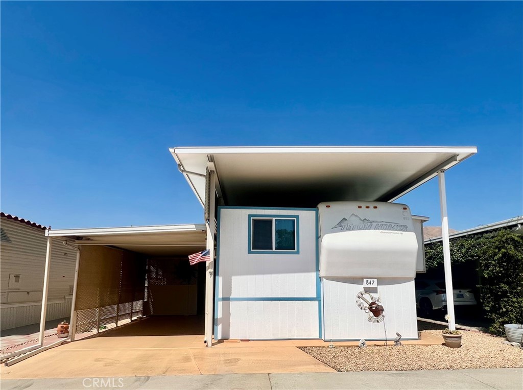 OWN YOUR LAND! Heritage Ranch highly desirable gated 55+ senior Community. Enter the home from the insulated covered carport, Charming fifth wheel with enclosed addition giving extra living space. Features include two bedrooms, two bathrooms, indoor laundry area with stackable washer/dryer unit included. Newer ductless mini split, there is plenty of natural light in this home. The covered carport has room for one vehicle and an outdoor area for entertaining along with a spacious storage shed with extra built-in cabinets and refrigerator. This is resort living at its best for $218 X month includes water, sewer, trash basic cable & internet. The spacious home offers peace and tranquility and the opportunity to have great gatherings with family and friends. This property is located near restaurants, grocery shopping, clinics and college. Great for commuters! A fantastic opportunity that will not be available for long schedule your private showing today and see for yourself!