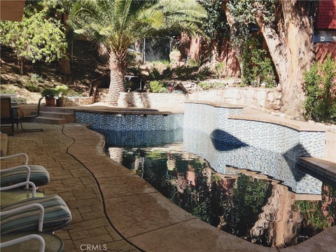 Photo of 7703 Skyhill Drive, Hollywood Hills, CA 90068 (MLS # SR26211904)