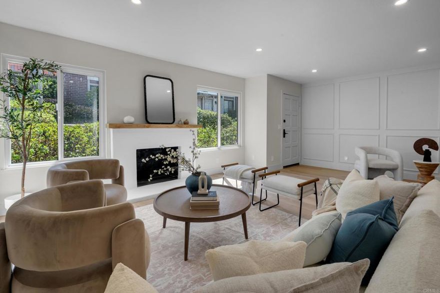 Discover this fully renovated townhome in Ridgegate’s gated community, where modern style meets everyday comfort. Light-filled interiors feature new luxury flooring, a sleek smooth-stucco fireplace, and a designer kitchen with quartz counters, custom cabinetry, matte gold hardware, and stainless appliances. Upstairs, the serene primary suite offers a walk-in closet and spa-like bath with dual vanities, a spacious walk-in shower, and chic finishes. Two additional bedrooms - with peekaboo ocean views - provide flexibility, while beautifully upgraded bathrooms complete the home. Enjoy your private patio, which directly accesses a spacious two-car garage complete with laundry hookups, plus the comfort of new windows and central A/C. Residents enjoy resort-style amenities including multiple pools, tennis and pickleball courts, lush greenbelts, and 24-hour guarded gates—all minutes from award-winning schools, beaches, hiking trails, Terranea Resort, and Trump National Golf Club.