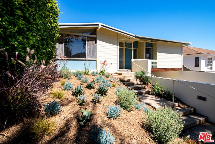 Fabulous updated Mid-Century Modern in an attractive upper Alphabet Streets location near village schools, shops, restaurants and services.  Entry steps lead to this single level home featuring 3 bedrooms, 1.75 baths, a living room, den, dining area and a large family room with fireplace that opens to a spacious patio and grassy yard. Refrigerator, microwave, new washer and dryer are included.