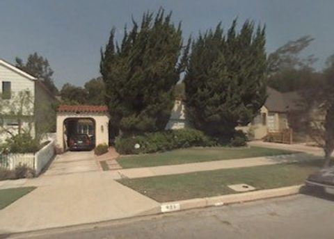 Photo of 411 N Bowling Green Way, Los Angeles, CA 90049 (MLS # SR25279576)