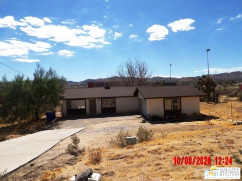 Photo of 56613 Sunnyslope Drive, Yucca Valley, CA 92284 (MLS # 26998911PS)