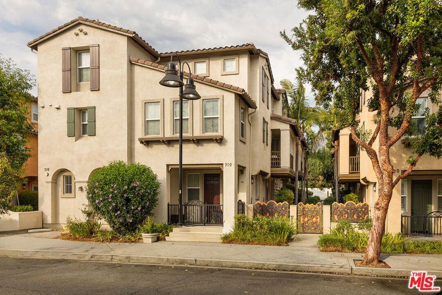 Conveniently located in Downtown Burbank, this spacious 3-bedroom, 2-bath condo with a bonus room and attached garage blends comfort, versatility, and thoughtful design. Spread across three levels, the entry floor provides direct garage access and a flexible bonus space--perfect for a home office, gym, or studio. The main level unfolds as an airy open-concept living space: the kitchen features abundant storage, newly updated appliances, and a generous granite peninsula ideal for casual dining. The adjoining living room centers on a cozy fireplace, with a door opening to a private patio that extends the living area outdoors. This level also includes one of two guest bedrooms, adding to the home's versatility. Upstairs, a light-filled primary suite offers an expansive closet and an en-suite bath with dual sinks, soaking tub, and separate shower. A second guest bedroom completes the top floor, providing added flexibility. Additional conveniences include in-unit laundry and an attached two-car garage. With its central location, well-planned layout, and move-in ready condition, this residence presents a rare opportunity to enjoy both space and ease in the heart of Burbank--just moments from the studios, Trader Joe's, AMC Burbank, restaurants, and convenient freeway access.