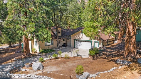 Photo of 40353 Valley Of The Falls Drive, Forest Falls, CA 92339 (MLS # IG26179929)