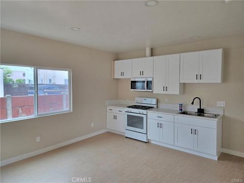 Photo of 6010 Kansas Ave, Los Angeles, CA 90044 (MLS # CV26018544)