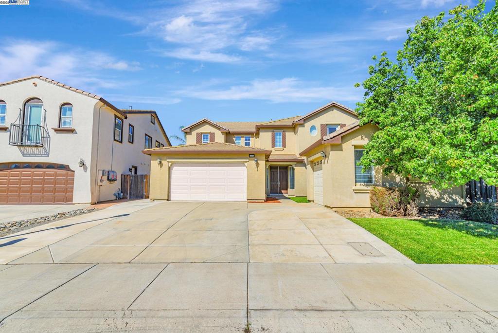 Located in the beautiful gated community of The Lakes. This luxurious, move-in ready, large home consists of 4 bedrooms, 3.5 bathrooms and a bonus room with many potentials. Great open floor plan with soaring ceilings throughout and lots of light. 1 bedroom and 1.5 bathrooms on the first floor. In addition to Central A/C there are ceiling fans in all rooms. The detached 3rd car garage could possibly be used for other purposes. The large kitchen consists of a huge island, pantry, gas stove top and new oven/microwave. The cozy Family Room with a gas fireplace and the huge Living Room ideal for entertaining guests. Walk-in closets in all bedrooms with 2 in the large Master Suite. Discovery Bay Community offers boating, golfing & much more. THIS IS A MUST SEE!!