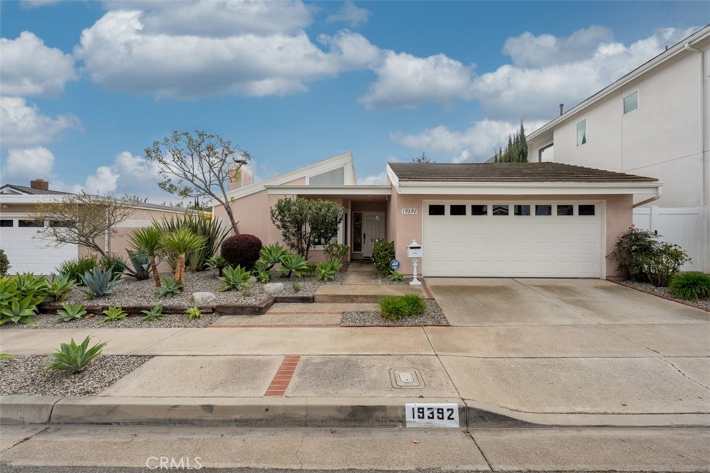 Located in the popular Sierra Bonita community of Turtle Rock, this single-story detached three-bedroom home, formal living and dining room with cathedral ceilings and laminate wood flooring with *Brand New Carpet* to be installed very soon. The living room features a garden window and a brick fireplace. The formal dining room overlooks the backyard patio and has sliding doors leading to the yard. The kitchen and breakfast nook have been upgraded with granite countertops and added recessed lighting. A bar/counter overlooks the spacious atrium. There are three generously sized bedrooms and two remodeled bathrooms. The hallway bathroom includes a new tub, full ceramic tile, a glass partition, pedestal sink, and custom fixtures. The primary bathroom has also been renovated with extensive tile work, a walk-in shower, and more. The home features double-pane windows and doors throughout. Both the front and back yards have recently been updated with drought-resistant landscaping. The oversized lot offers exceptional privacy and includes a brick patio. Walking distance to the award-winning Bonita Canyon Elementary School. The community offers excellent amenities. Top-ranked University High School.