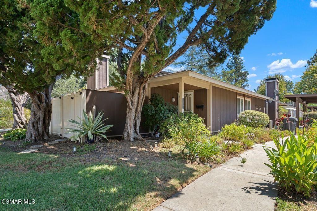 This charming single-story home offers comfort, privacy, and convenience in one of the best spots within the Annadale community. A rare end unit with only one shared wall, it features a bright and spacious interior with wood-style flooring throughout, fresh paint, and newer windows. The open-concept living area includes a cozy travertine fireplace and flows seamlessly to a large private patio through dual sliding glass doors--perfect for relaxing, dining, or entertaining. The kitchen is fully equipped with granite countertops, custom cabinetry, and ample storage. Both bathrooms have been beautifully updated. The spacious primary suite includes a walk-in closet with custom shelving and its own private patio area. The two additional bedrooms offer flexibility. The home also includes in-unit laundry with a washer and dryer, central AC and heating, and a large enclosed patio with a vinyl fence that folds down to enhance the beautiful view as well as 2 covered car spaces. Residents enjoy access to a community pool, clubhouse, and nearby parks, and the property is located within the highly-rated Las Virgenes School District with easy access to the 101 freeway. Water is covered by the association. Don't miss this opportunity to live in a beautifully maintained home in a fantastic location.
