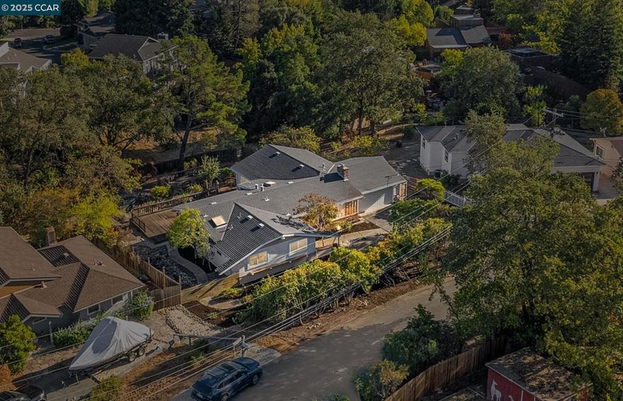 Open house Sat 10/18 & Sun 10/19 12-3pm Welcome to 61 Grandview Place, a spacious 4 bedroom, 2 bathroom home offering 1,975 sq ft of living space on a generous .42-acre lot. This original residence provides an excellent opportunity to update and design to your taste, while enjoying a truly unique outdoor setting.  The backyard unfolds across three distinct levels: the first features an expansive deck with a tranquil, non-operational koi pond; the second offers another large deck area with a massive koi pond that could be reimagined into a pool; and the third opens to a private natural retreat with mature trees and wide-open land, creating a serene backdrop with endless possibilities.  Set on a peaceful hillside in Walnut Creek, this single-level home balances privacy with convenience, just minutes from downtown. Its prime location offers easy access to BART, major commuter routes, and highly rated Walnut Creek schools including Parkmead Elementary, Walnut Creek Intermediate, and Las Lomas High.