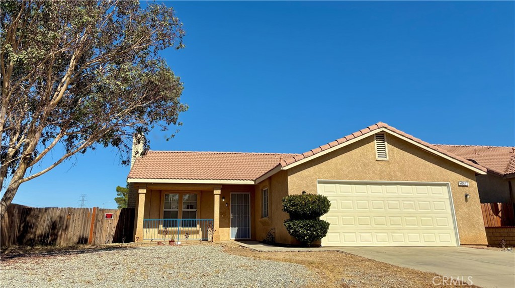 Welcome to this beautifully updated single-story Spanish Ranch, where timeless character meets modern elegance. Meticulously renovated, this home features refreshed kitchen and bathroom spaces with sleek quartz countertops. The open floor plan is enhanced by vaulted ceilings, a cozy fireplace, and abundant natural light, all complemented by stylish tile and luxury vinyl plank flooring. Step outside to a low-maintenance front yard designed with gravel and vibrant desert plants for striking curb appeal. The private backyard patio provides the perfect setting to relax or entertain while enjoying peaceful views. ? With thoughtful upgrades throughout, this move-in ready home is offered as-is — ready for its next chapter.