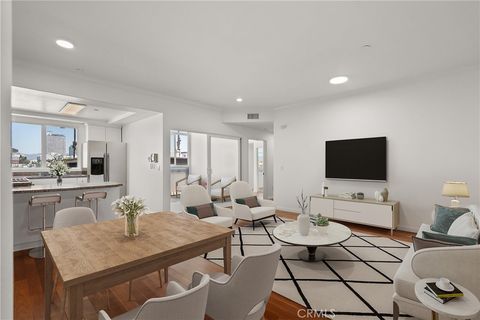 Photo of 949 S Manhattan Place #203, Los Angeles, CA 90019 (MLS # SR26101393)