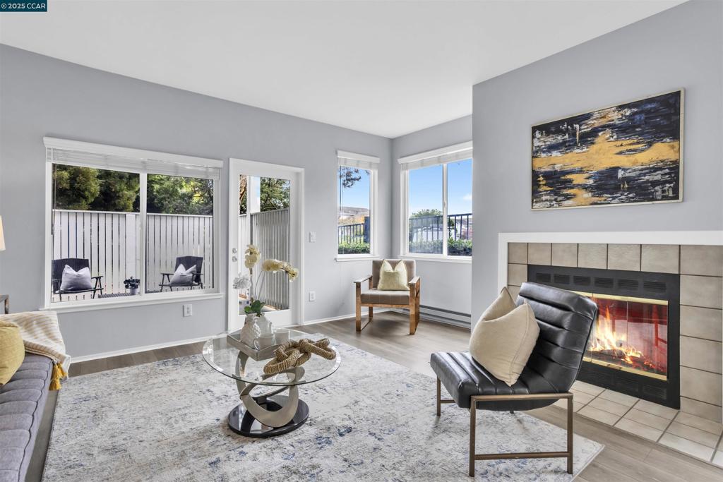 Enjoy coastal, resort-style living in the Marina Bay community! This premier end-unit condo offers an open-concept floor plan with thoughtful updates throughout. Highlights include a fully remodeled guest bathroom with a new walk-in shower and vanity, complemented by newer flooring and fresh paint that create a bright, modern feel. The convenience of ground-floor living is paired with a private patio just outside your door. Spend weekends strolling the Bay Trail or exploring the Marina Bay Farmers Market. Located in a gated waterfront community, commuting is effortless with access to the Richmond Ferry and major freeways nearby.