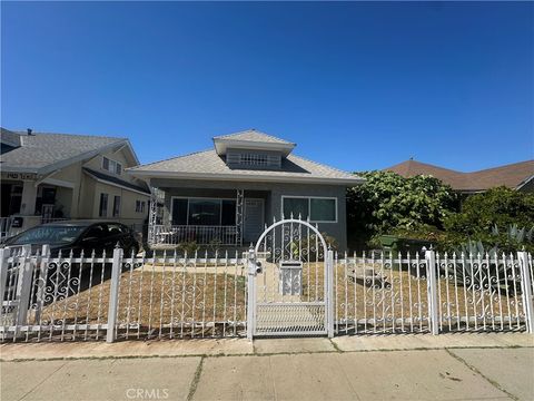 Photo of 1409 E 41st Place, Los Angeles, CA 90011 (MLS # SR25238926)
