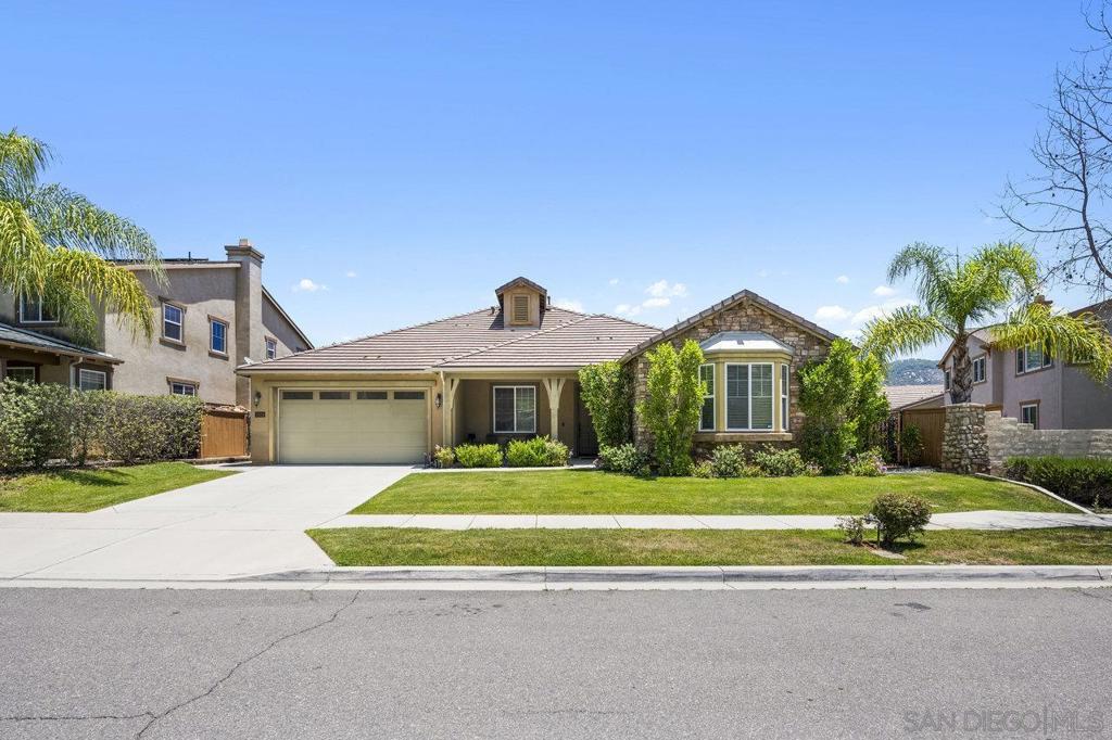 Discover the exceptional living experience awaiting you at 2928 Burnet Drive, Escondido, CA. This spacious 4-bedroom, 2 1/2-bathroom home spans 2,920 square feet, offering ample space for comfort and versatility. Step into the open-concept living area, where an island kitchen with elegant granite countertops seamlessly flows into the family room, perfect for entertaining or relaxing by the cozy fireplace. The home office provides an ideal space for productivity or quiet reflection. With both carpet and tile floors, the design complements every lifestyle. Enjoy the California sunshine in one of the largest backyards in the community, an oasis featuring low-maintenance artificial turf and spectacular views of the foothills. Whether you're warming up with central heating or cooling off with central AC, this home ensures year-round comfort. The owned solar system enhances energy efficiency and sustainability. A dedicated laundry room provides functionality, while the proximity to a large dog park is perfect for pet lovers. This home combines modern amenities with unique features, such as Nest thermostats and zoned air conditioning, ensuring a lifestyle of ease and enjoyment. Don't miss the opportunity to own a piece of Escondido charm in a serene and convenient location. Contact us to explore more about this captivating property and its potential to become your dream home.
