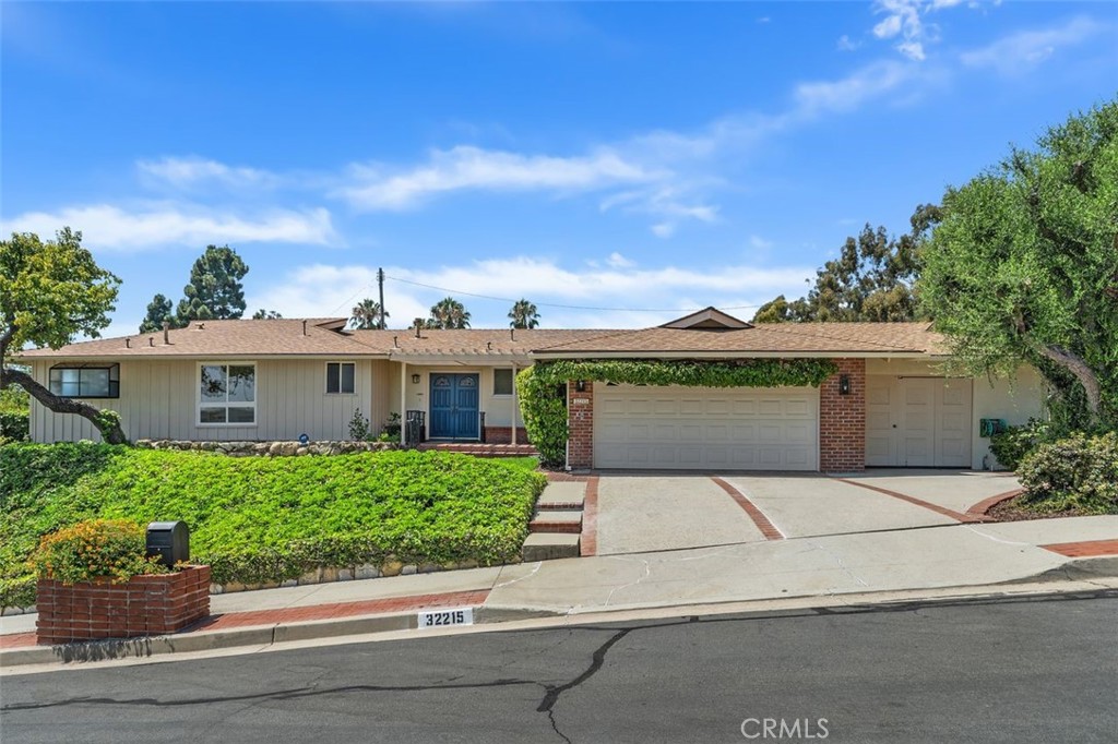 Discover the perfect blend of comfort, space, and stunning ocean views in this inviting single-level home, tucked at the end of a quiet cul-de-sac in Rancho Palos Verdes. Enjoy breathtaking vistas from the primary suite, front yard, and expansive backyard—ideal for everyday living and entertaining. This well-maintained 4-bed, 3-bath home sits on a generous 15,184 sq ft lot, offering endless possibilities for outdoor fun. Inside, brand-new flooring and fresh paint create a bright, modern feel. The spacious kitchen features ample storage, an eat-in nook, and easy flow to the dining area and cozy living room with a fireplace. Start your day in the enclosed sunroom or relax on the large deck, perfect for gatherings or soaking in the coastal breeze. A roomy laundry area, versatile two-car garage with workshop space (great for hobbies and storage), and a flat, usable yard add to the home’s appeal. Enjoy peaceful living surrounded by greenery, just minutes from hiking trails, Ladera Linda Park, Abalone Cove, Trump National Golf Club, Terranea Resort, and top-rated Palos Verdes schools.