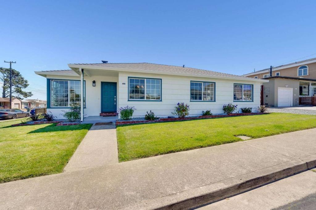 Completely remodeled and ready-to-move-in home, situated on a desirable corner lot in the Winston Manor Tract of SSF. This charming residence has been thoughtfully updated from top to bottom, offering both style and function. The heart of the home is a brand new kitchen, featuring sleek quartz countertops and a full suite of stainless steel appliances perfect for the home chef. The bright and open living area is anchored by a classic wood-burning fireplace, creating a warm and inviting atmosphere. Durable, new laminate floors flow seamlessly throughout the home, leading to a newly renovated bathroom and comfortable living spaces. Don't miss the large rear yard, perfect for kids play, adult entertainment or ... future expansion if needed. The updates continue outside with a brand new roof, double-pane windows, and a newly landscaped yard complete with automatic sprinklers. Enjoy the best of South San Francisco living with a prime location that is a short walk from local shops, delicious restaurants, and Elkwood park. Commuting is a breeze with quick access to major highways 280, El Camino, SFO, and Bart Station.