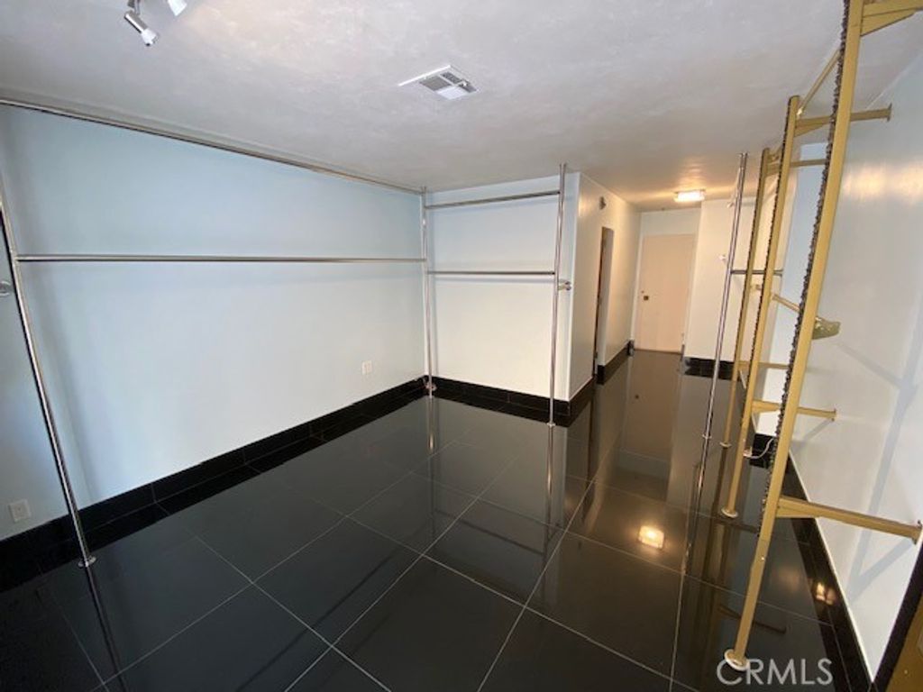 Photo of 1333 S Beverly Glen Blvd #105, Los Angeles, CA 90024 (MLS # SR26021786)
