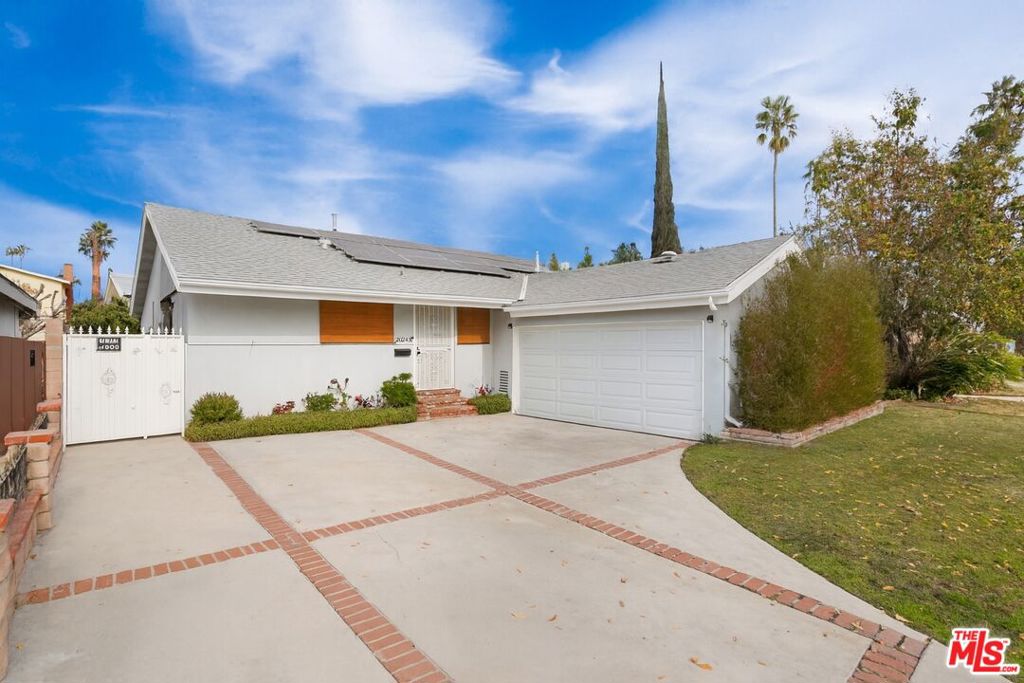 Welcome to this beautifully updated 4-bedroom, 2-bath home that perfectly combines modern style with family-friendly living. Situated on a quiet street with walking access through the park, this property offers the best of comfort, convenience, and community.Step inside and you'll be greeted by a bright, open layout filled with natural light. The kitchen is the true heart of the home, featuring a large center island, stainless steel appliances, and newer systems, along with a convenient in-unit washer and dryer. A stylish dry bar adds the perfect touch for entertaining, while the generously sized bedrooms provide ample space for the whole family one even includes a cozy fireplace for added character. The primary suite serves as a relaxing retreat with plenty of storage and closet space.The backyard is designed for privacy and low maintenance, with tall fencing, expansive space for gatherings, and a charming gazebo ideal for family barbecues or simply enjoying the outdoors together.Additional highlights include fully paid-off solar panels for energy efficiency and permitted ADU plans for the garage, giving you excellent potential for expansion or rental income. All of this in a highly walkable, family-oriented neighborhood just steps from the park and within walking distance to local shops. grocery stores and the post office. This home truly checks every box for comfort, convenience, and long-term value.