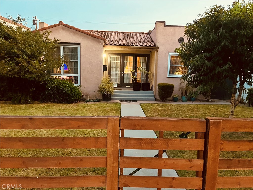 Welcome home to this Spanish revival charmer, in the heart of the De Forest area of North Long Beach. Spacious and bursting with charm, this two-bedroom, one bath home boasts both cove and tray ceilings, quaint built-ins, niches, AND a bonus room! The galley kitchen has granite countertops, a gas range and room for a breakfast table under the front window. Its sizable, fenced backyard with a flagstone patio, is the perfect space for entertaining. There is a separate one-car garage and a second off-street parking space in the alley, and fresh paint on the exterior of both the home and garage. Storage is no problem with space in the garage, and a shed on the side of the home. The bike lane out front leads to De Forest Park, its pickleball courts, walking paths and wetlands, and there is plenty of entertainment to be found in the surrounding areas, including in nearby Bixby Knolls.