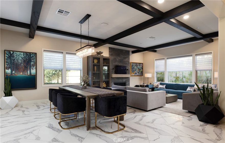 Exquisite Living in Altair, Irvine

Located within the prestigious guard-gated community of Altair, this beautifully appointed residence blends timeless elegance with modern comfort.

The main level welcomes you with expansive 24”x24” porcelain tile floors, a private guest suite with full bath, and a gourmet chef’s kitchen featuring a professional cooktop, double ovens, and built-in microwave. Designed for effortless entertaining, the open-concept layout flows into a spacious California room with fireplace, creating a seamless indoor-outdoor experience.

Upstairs, rich hardwood floors lead to a versatile loft and three generously sized bedrooms, each complete with an en-suite bath and walk-in closet. In all, the home offers four full bathrooms plus a powder room, thoughtfully designed for both family and guests.

Step outside to your private backyard sanctuary, where three serene fountains, a built-in BBQ, and a fire pit lounge invite relaxation. With no homes behind, enjoy unobstructed views of the natural reserve and spectacular sunsets from nearly every room.

As part of Altair, residents indulge in resort-inspired amenities including two sparkling pool and spa areas, a sophisticated clubhouse, and miles of scenic walking trails.