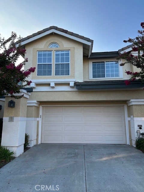 This beautifully remodeled 3 bedroom and 2.5 bath townhome is ideally located in the gated Mirasol community. Luxury wood flooring, redesigned and oversized quartz peninsula in the totally remodeled kitchen comfortably seats four, white cabinetry with high-end pulls, under mount lighting, pull-out spice rack, illuminated display cabinets, soft closing doors and drawers, LG stainless appliances and custom pantry cabinets. Primary bath is remodeled with walk-in shower, separate bath tub, walk- in closet and so much more...private patio off of the living area. 2 car direct access garage with laundry area and overhead storage. Community amenities offer pool and spa.