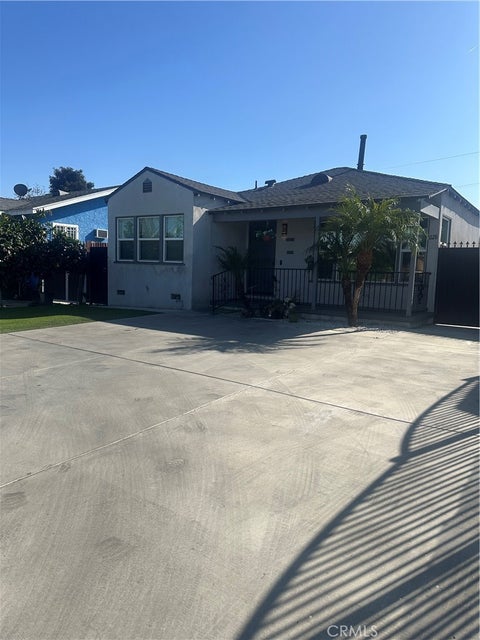 Photo of 1126 E 106th St, Los Angeles, CA 90002 (MLS # DW26129348)