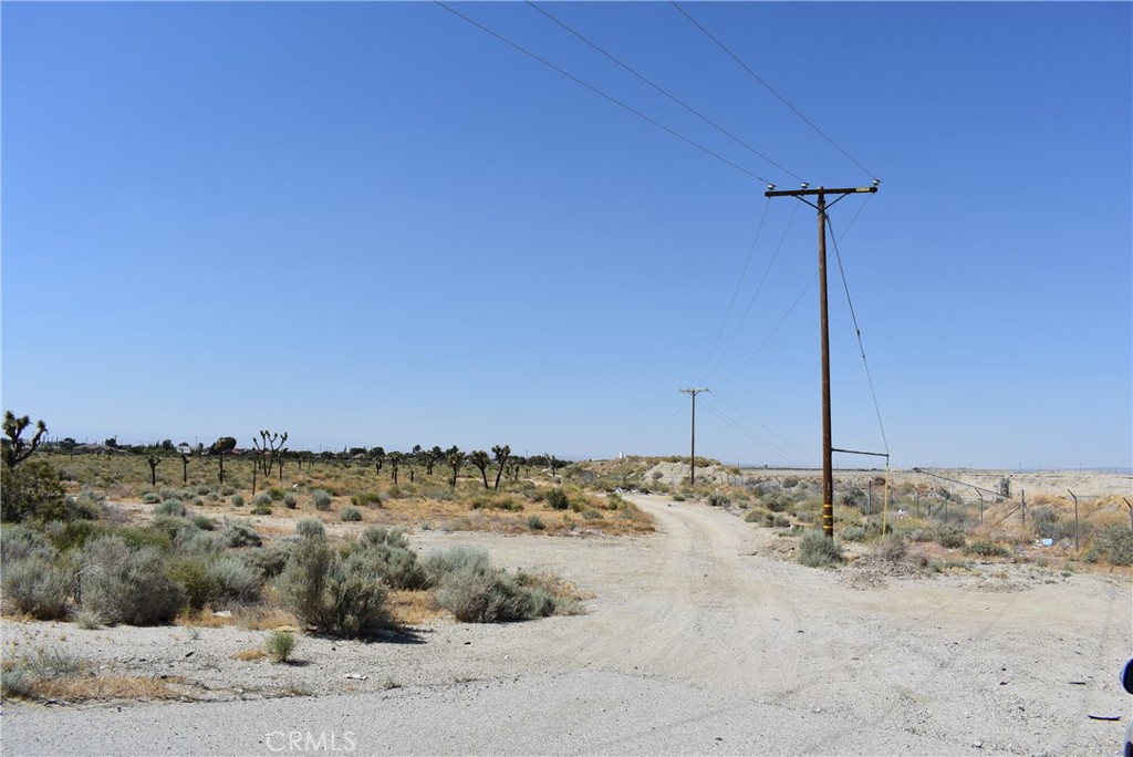 5.3 acre lot on Pearblossom Hwy at the corner of 62nd St E. APN 3050-008-032. Zoning is LCRA1 for residential agriculture.