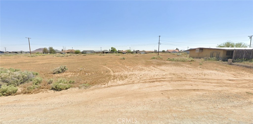 Rare opportunity to own 0.22 acres in California City with all utilities ready - electricity, water, and public sewer already available. This flat, 80x121 foot parcel on paved Tamarack Avenue offers immediate development potential in Kern County's growing desert community. Located just 30 miles from Edwards Air Force Base and 100 miles from Los Angeles, this residential-zoned lot provides exceptional accessibility via Highway 14. The property sits in an established area with infrastructure in place, eliminating typical rural development challenges. Perfect for custom home construction or investment, with an adjacent lot also available for expanded ownership. GPS coordinates 35.10919, -117.96991. Don't miss this utilities-equipped parcel in California's third-largest city by area, offering desert living with metropolitan access.