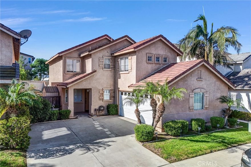 Welcome to this spacious and beautifully maintained 4-bedroom, 2.5-bathroom home, located in a desirable gated community in Corona. Offering the perfect combination of comfort, convenience, and security, this home is an ideal choice for families or anyone seeking a peaceful, well-established neighborhood.

Key Features:

4 Generously Sized Bedrooms: Ample space for family and guests.

2.5 Bathrooms: Including a luxurious master ensuite with a dual vanity, walk-in closet, and a large shower – the perfect retreat.

Spacious Kitchen: Featuring a bar for easy meals and entertaining, with plenty of counter and cabinet space for all your culinary needs.

Inviting Living Areas: A bright and open concept living room with a charming fireplace to enjoy during cozy evenings.

Separate Dining Room: Perfect for hosting family dinners and gatherings.

Inside Laundry Room: Added convenience with a dedicated laundry space.

Private Yard: Enjoy the privacy of a spacious backyard, complete with a covered patio – ideal for outdoor dining, relaxation, and entertaining.

2-Car Garage & Spacious Driveway.

Community Perks: Access to a nearby community park for outdoor activities and family fun.

Prime Location: Conveniently located near top-rated schools, shopping centers, restaurants, and with easy freeway access for commuting.

This home offers an incredible layout with ample space to grow and make lasting memories. Whether you're enjoying the cozy interior, entertaining in the backyard, or exploring the community amenities, this property is great

Don’t miss out! Schedule a tour today and see for yourself why this is the perfect place to call home.