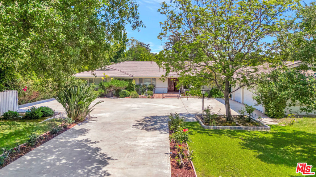 Welcome to 1100 Rodeo Road a beautifully maintained, single-story residence that reflects the pride of decades-long ownership in every detail. Situated on a 35,000+ square foot lot, this elegant estate offers over 3,000 square feet of living space, combining timeless design with spacious functionality in one of Arcadia's most desirable neighborhoods. A long, private driveway leads to a three-car garage, offering ample parking for a large household or car collection. An entry ramp provides added accessibility for elderly or physically challenged residents or guests. Inside, the home features living, dining, a den/office with backyard views, and laundry areas, complemented by custom built-in cabinetry throughout. Hardwood flooring, recessed lighting with dimmers, and skylights that bring in beautiful natural light are additional highlights of this amazing home. The family room just off the kitchen includes a stylish tray ceiling, creating a warm, inviting atmosphere perfect for everyday living or hosting. The fully remodeled kitchen is equipped with top-of-the-line appliances, including a custom Thermador refrigerator and a new Bertazzoni gas range, as well as double sinks, a food warmer, and three dishwashers making it a true centerpiece for any culinary enthusiast. The primary suite showcases two walk-in closets, a newly remodeled en suite bath, and direct access to the backyard, offering both privacy and convenience. A covered back patio overlooks the expansive yard, providing the perfect space for outdoor dining, entertaining, or peaceful relaxation. This property also includes a detached guesthouse with two separate rooms, ideal for extended family, visitors, or creative use as a studio or office adding flexibility and value to an already exceptional home. 1100 Rodeo is ideally located near bustling The Shops at Santa Anita mall, the beloved LA County Arboretum & Botanic Garden, and the historic Santa Anita Park racetrack, as well as outdoor recreation and the stunning views at Chantry Flats (Angeles National Forest). The home also enjoys close proximity to Pasadena's most beloved destinations, such as Old Town and fine-dining restaurants, all while offering a peaceful, residential setting. Water and weekly landscaping to be paid by owner. This is a rare opportunity to lease a gorgeous estate property that combines scale, comfort, and location in one of the San Gabriel Valley's most sought-after communities.