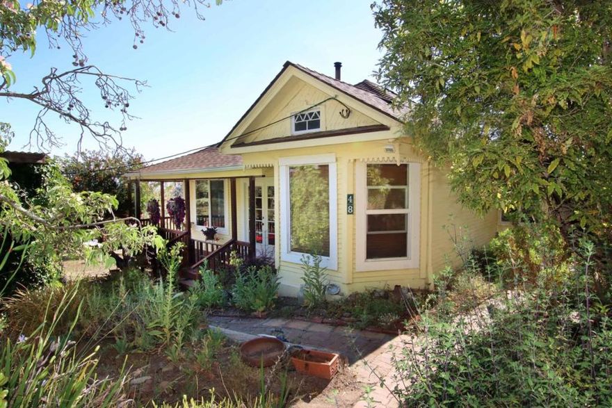 From much of this magical 7.7acre property you can see both the sunrise, & the sun setting over the ocean. This is a rare combination of rolling fields and gorgeous views over the Pajaro valley out to Ventana Wilderness. Perfect for a multi-family compound. 2 Separate & private homes plus Barn/studio. The 1912 ranch house with 3 bedrooms, original fir floors, old fashioned parlor, claw-foot tub/shower, farmhouse kitchen with ocean view & wrap around porch ideal for relaxing & watching wildlife & long vistas. The second 1966 home is 2b/2ba & has its own private garden, patio, sitting deck & 2 car garage. A recently renovated  barn is set up as its own special unit w/ a sleeping loft that looks out over the land, offers additional living area. There is an artist studio & workshop area. All this land is accented w/ multiple mature fruit trees & garden areas - Orange, persimmon, avocado, plum, apple. Many lovely sitting areas w/ views over the rolling fields and glorious property with areas to hike & explore. Good well withnew pump. 2 Septic systems with clearance.