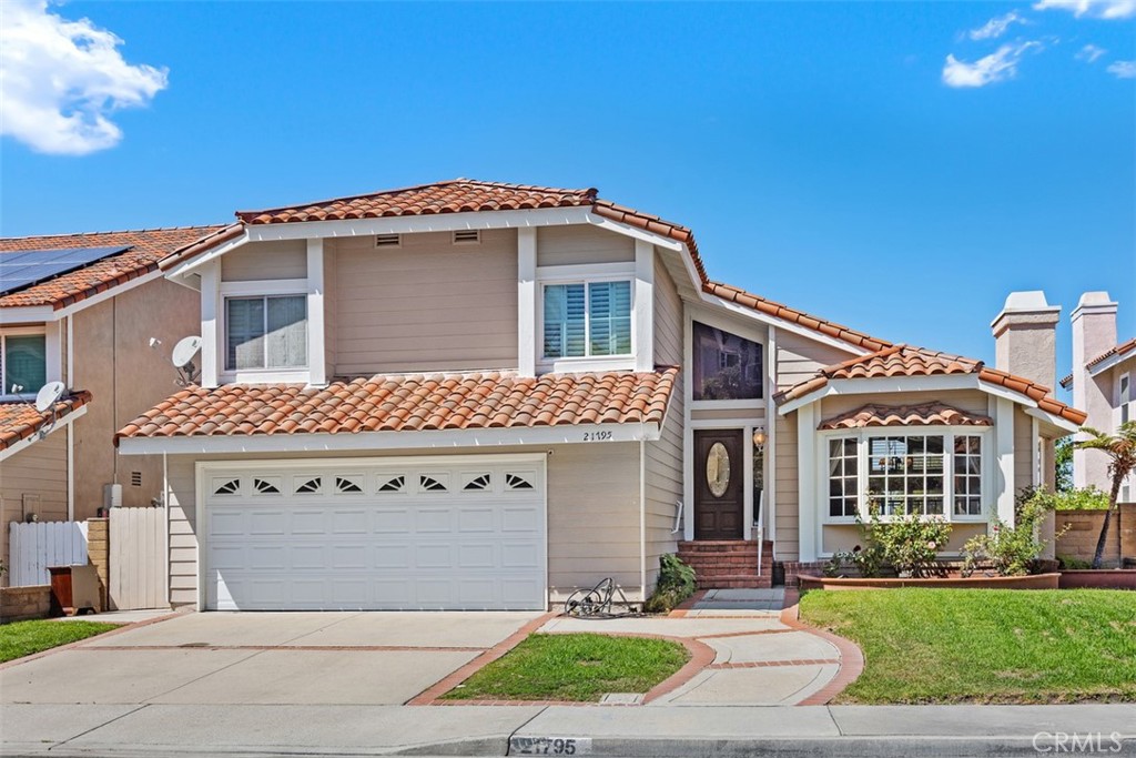 Mission Viejo Classic! Located on a private single loaded street and culdesac, 1 mile to the lake. Constancia is one of the highest streets in North Galicia, with striking sunset views and uplifting panoramic views, for added value. The home features beautiful hardwood floors, vaulted ceilings, skylights, and 3 fireplaces. The large, covered, walk-out patio is perfect for entertaining. The remodeled kitchen has sleek stainless steel appliances, an island, pantry, and breakfast nook. All 3 bedrooms have walk-in closets. The luxurious Primary Suite includes a spacious deck, walk-in shower, dual sinks, 2 closets, cozy fireplace, and windows with views. The oversized 2 car garage has room for a workshop. This is the first time this home has been on the market since it was built in 1979, and you can tell it has been maintained with love and care.