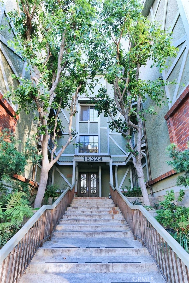 Experience exceptional living in a highly sought-after gated community in prime Tarzana with this beautifully upgraded 2-bedroom, 2-bathroom condo featuring a rare and desirable layout with dual primary suites, each offering its own en-suite bathroom and generous closet space, including a large walk-in closet in the main suite. The interior boasts a bright and open floor plan with abundant natural light, fresh paint throughout, and stylish finishes that create a warm, inviting atmosphere. The spacious living room includes a cozy fireplace, a wet bar for entertaining, and direct access to a large private balcony surrounded by greenery—perfect for relaxing or enjoying your morning coffee. The spacious kitchen is a chef’s dream, complete with custom cabinetry, a large center island, a new counter-depth refrigerator, new over-the-range microwave, newer stainless steel appliances, and ample counter space and storage. Additional upgrades include a high-efficiency central A/C unit and water heater, ensuring year-round comfort and energy savings. A full-sized in-unit laundry room offers added convenience. Located just steps from the community pool and jacuzzi, the unit is situated in a secure, well-maintained complex with lush landscaping, a peaceful setting, and two assigned parking spaces in a gated garage. Prime location with easy access to the 101 Freeway, Ventura Boulevard’s top restaurants, shopping, grocery stores, gyms, and minutes from Cedars-Sinai Medical Center – Tarzana. Water and trash are included in the rent, and the unit is ready for immediate occupancy. This is a rare leasing opportunity that offers comfort, privacy, and convenience in one of the Tarzana most desirable neighborhoods.