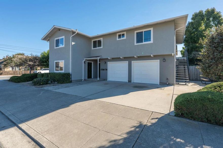 Located in the highly coveted, rarely available neighborhood of Oak Grove, this newly remodeled duplex awaits its next owners. Capitalize on this prime location just steps from Lake El Estero, Del Monte Beach, MPC and NPS. Situated on an immaculately landscaped corner lot, the property encompasses two renovated units, each featuring a garage, new laminate wood flooring, new interior and exterior paint, new windows, new wall heaters, and gorgeous new quartzite kitchen counters. Well suited to multi-generational living, this property is ideal for investors or first-time buyers. Live in one, and rent the other! Enter the first unit on the ground floor, and step into a light-filled living room. Pass through an informal dining area into a pristine kitchen with abundant cabinetry. Upstairs, find a full bathroom and two bright bedrooms. The second unit has an upstairs entry and offers two bedrooms, one full bathroom, and charming neighborhood views that situate it distinctly within Monterey.