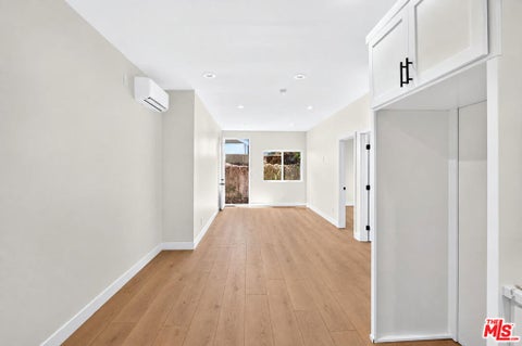 Photo of 153 W 51st Street #1/2, Los Angeles, CA 90037 (MLS # 26996467)