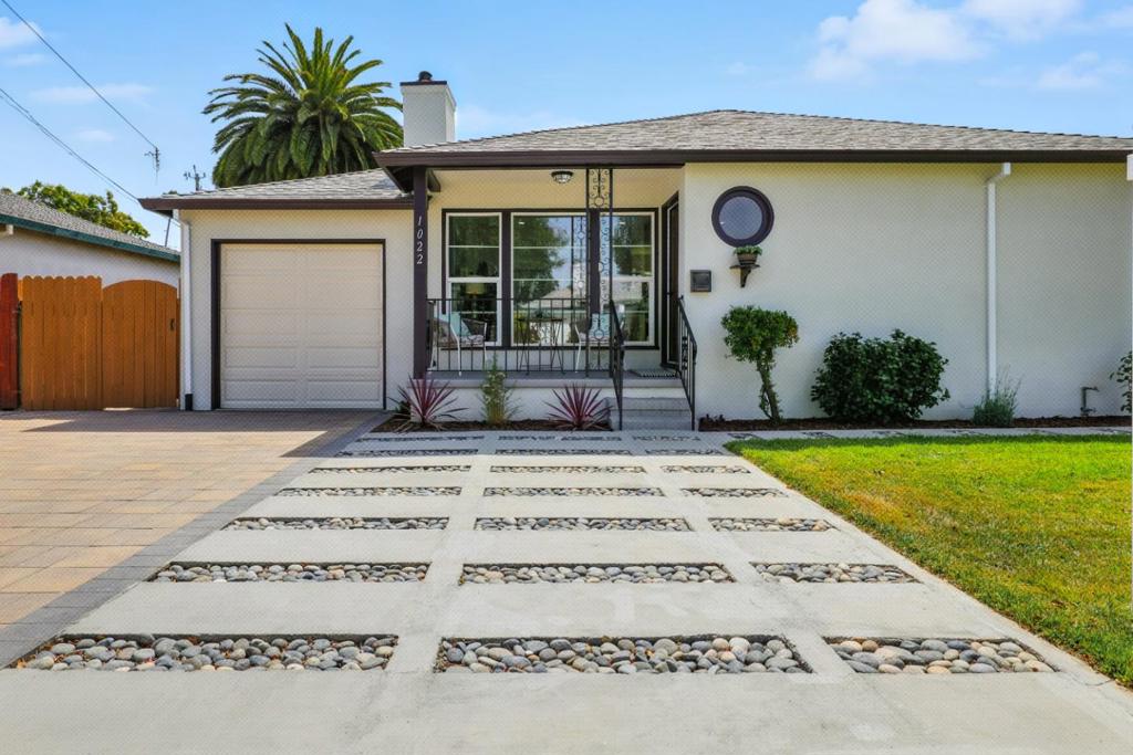 Welcome to 1022 E Santa Inez Ave, a charming 2BR/1BA single-family home in the heart of the Peninsula. This move-in ready home features all dual-pane windows and fresh interior and exterior paint. The inviting front yard showcases a custom paver driveway, new garage door, and a roof only three years old. Step inside to a bright living room with recessed lights, large windows, and a cozy wood-burning fireplace. The dining area overlooks the backyard, filling the space with natural light. The remodeled kitchen, completed with permits, boasts high-end stainless steel appliances, quartz countertops, and custom cabinets. The bathroom, also with permits, is updated with a custom vanity, tile floors, and a sleek glass-enclosed shower. Both bedrooms are spacious and sunlit. The private backyard is perfect for entertaining, with a paver patio, lawn, and lush landscaping. Excellent schools nearby include San Mateo High, Fiesta Gardens International, and others. Enjoy a central location with easy access to community centers, golf course, Hwy 101, Caltrain, Downtown San Mateo, Central Park, the Japanese Garden, shopping centers, and more. A wonderful opportunity for comfortable living and long-term value!