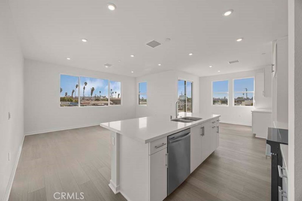 Photo of 107 S. Laxore St #408, Anaheim, CA 92804 (MLS # OC26014304)