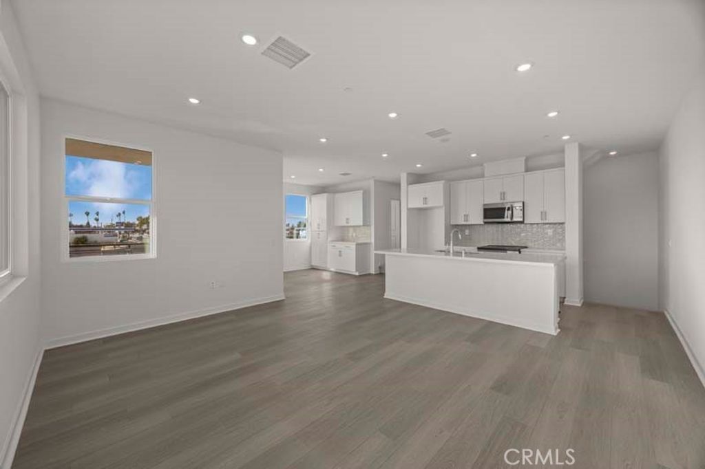 Photo of 107 S. Laxore St #408, Anaheim, CA 92804 (MLS # OC26014304)