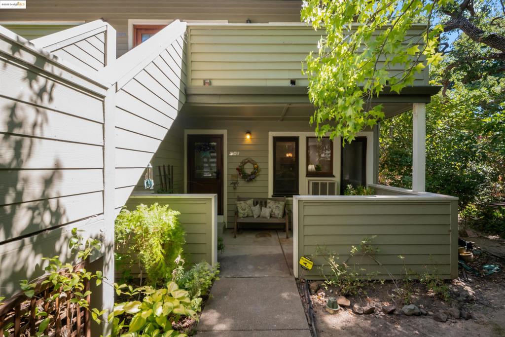 Tucked into one of Pleasant Hill’s most peaceful, tree-filled communities, this beautifully updated 3-bedroom, 2-bath home feels like a garden retreat. It’s a ground-floor unit with a charming porch, private garage, and plenty of guest parking. Inside, you’ll find brand new wide-plank laminate flooring, fresh paint, and wood-trimmed windows that fill the space with natural light. The remodeled kitchen features new cabinets, granite countertops, and a modern layout. The primary bedroom has vaulted ceilings and a private balcony overlooking trees and greenery. It's located on the ground level. Both bathrooms are tastefully updated. Downstairs are two more bedrooms, also updated, with one opening to a second balcony with beautiful views to help you relax and unwind. The laundry closet with washer and dryer is conveniently downstairs. The complex offers a rustic charm with tall trees, walking paths, a sparkling pool, and well-kept grounds. All this, just minutes to freeways, shopping, dining, and schools. A perfect blend of nature, comfort, and convenience. OPEN HOUSE Sat 8/2 12-2:30 pm and Sun 8/3 12-2PM.