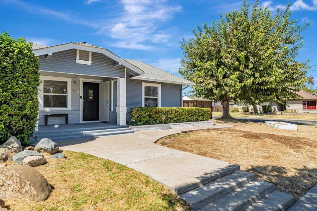 Welcome to 1561 Bessie Avenue, a charming 3-bedroom, 1-bath home located on a spacious 6,272 sq ft corner lot in the heart of Tracy. What truly sets this property offering flexibility for future use, whether you're considering expansion, or adding an ADU. The lot features gated RV access and plenty of room for additional parking, storage, or outdoor entertaining. Inside, the home offers a warm and functional layout filled with natural light. Ideally situated within walking distance to both an elementary and a middle school, it's perfect for families or those looking for a centrally located property. Youre also just minutes from downtown Tracys restaurants, shops, parks, Tracy High School, the transit station, and have quick access to both I-205 and I-5, making commuting a breeze. This is a fantastic opportunity to own a well-kept home on a large lot with room to grow and multiple possibilities. Love where you live!
