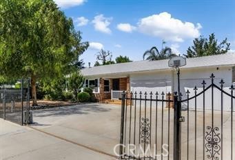 PRICE REDUCTION!! Ideal corner lot 3 bedroom, 2 bath home in Canoga Park. The living room has a beautiful fireplace for those cool winter nights. The kitchen has granite counters and stainless appliances. There is a charming, covered patio located off the kitchen so you can dine al fresco in our ideal Southern California weather. Family room, living room, dining room, laundry room. Hardwood floors, washer dryer, dishwasher, 2 refrigerators. Down the hall is a family room with built in bookshelves and a primary bedroom and bath. There is an outdoor sitting area is located off of the family room. The backyard is filled with fruit trees and also has ample storage. There is an opportunity to rent out one bedroom and one bath that has a separate entrance and courtyard. Buyer to verify square footage, and all other relevant information. The information herein is deemed to be from reliable sources but is not guaranteed.