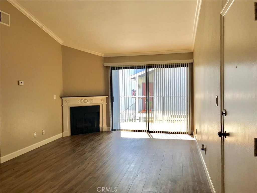 Fully remodeled Condo located in the Gated Community Hampton Gardens. This 2 bedroom 2 full bath upstairs condo is ready to move in. One carport and one parking permit but no garage. Laundry room is next to the swimming pool nearby. Very convenience location close to Markets, Restaraunts, Banks, Starbucks and 60 Freeway. Rent includes water and trash. All appliances are ready including refrigerator.