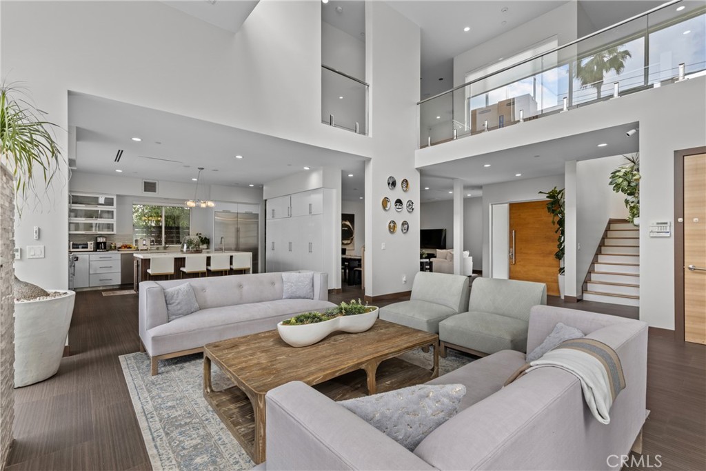 Just a short stroll away are grocery stores, cafés, restaurants, and a lovely local park!
Furnished, modern-contemporary gem in the prestigious Encino Hills. This two-story home spans nearly 4,000?sq?ft, offering 5 bedrooms and 4½ bathrooms, with a clean-lined design, expansive windows, and seamless indoor-outdoor integration. The open-concept living space is drenched in natural light, highlighted by lofty ceilings, premium finishes, and a gourmet kitchen featuring custom cabinetry and top-tier appliances—perfect for entertaining or everyday life.