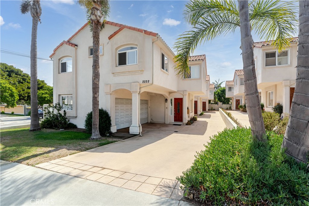 Welcome to this Mediterranean-inspired 3 bedroom, 3 bath renovated townhome ideally situated on a coveted corner lot in North Redondo Beach. Step inside to soaring ceilings, abundant natural light, and an open layout that creates a warm, inviting flow throughout. The gourmet kitchen is finished with granite countertops, stainless steel appliances, and a breakfast bar that opens seamlessly to the dining and living areas - perfect for hosting and entertaining. The spacious primary suite offers a private retreat with vaulted ceilings, a cozy gas fireplace, walk-in closet, and a spa-like bath featuring dual sinks, granite finishes, and a soaking tub.
Generously sized secondary bedrooms, a versatile bonus room, and a full laundry area provide flexibility for work, guests, or recreation. Enjoy the added privacy of a corner lot with an enclosed yard ideal for dining outdoors or relaxing in the ocean breeze. Additional highlights include an attached two-car garage, elegant tile and hardwood flooring, and thoughtful modern details throughout. Literally across the street from Perry Park, and just moments from local dining and Redondo Beach’s shoreline, this home combines comfort, luxury, and convenience. Don’t miss the opportunity to make it yours—schedule a showing today.