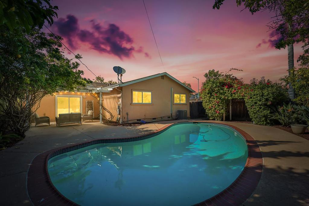 Welcome to 4510 Calaveras Avenue. a charming corner-lot retreat nestled in one of Fremont's most desirable neighborhoods.This lovingly upgraded 3-bedroom, 2-bath single-family home offers 1,269 sq. ft. of stylish living space on a generous 6,415 sq. ft. lot.Step inside and you'll immediately feel the warmth of a thoughtfully designed home that blends comfort, function, and flair.The fully renovated kitchen (2019) is a showstopper. completely reimagined from wall to wall with brand-new flooring, sleek countertops, modern cabinetry, premium appliances, and a powerful smoke vent hood. Recessed and designer LED lighting throughout the home adds ambiance and a touch of elegance.Both bathrooms have been refreshed, with the guest bath fully renovated for a clean, modern finish. The home also features a brand-new HVAC system (2022), ensuring year-round comfort.Out back, an entertainers dream awaits two pergolas, a sparkling pool with a new pump and robotic cleaner, and plenty of open space to host unforgettable gatherings or simply relax under the sun. Mature palm trees lend a resort-style vibe, while a flourishing lemon and apple tree bring seasonal delights. With a high Walk Score and Bike Score, this location offers the perfect blend of convenience, charm, and lifestyle.