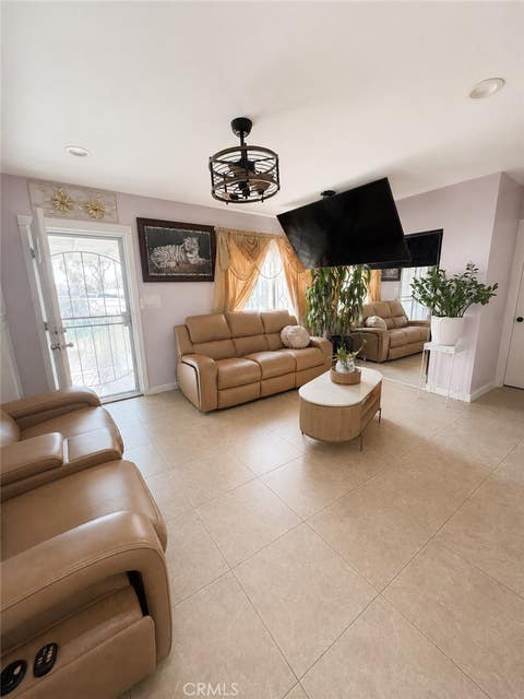 Photo of 314 S Barron Ave, Compton, CA 90220 (MLS # DW26131530)